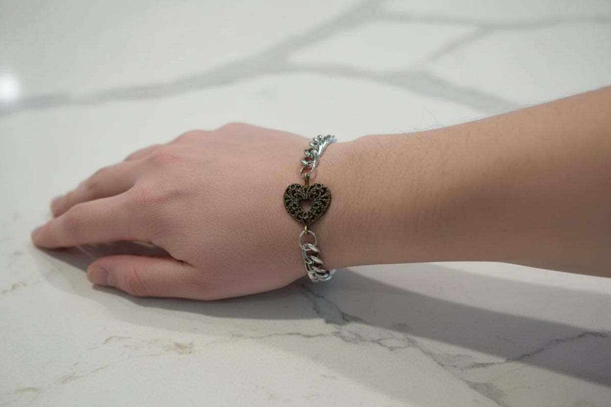 Bracelet - 7 inches antique bronze heart on silver curb chain