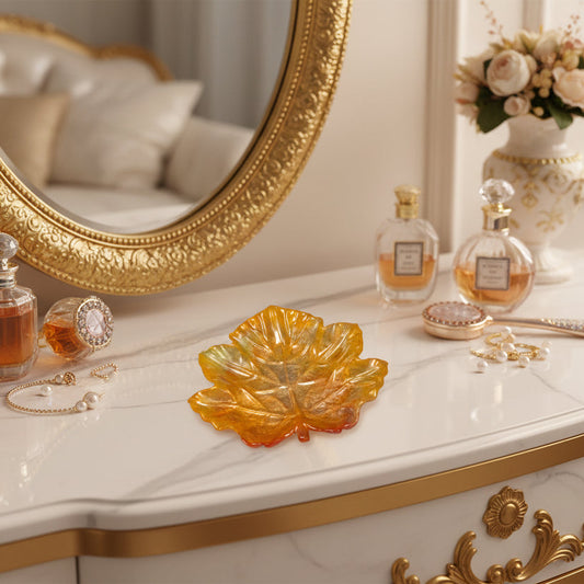 Elevate your space with the Knickknack Resin Maple Leaf Trinket Tray. Crafted with care, its vibrant maple leaf design adds a touch of nature-inspired charm while keeping your small essentials organized. Perfect for keys, jewelry, or coins, this tray combines functionality with seasonal style, making it a must-have accent for any room.