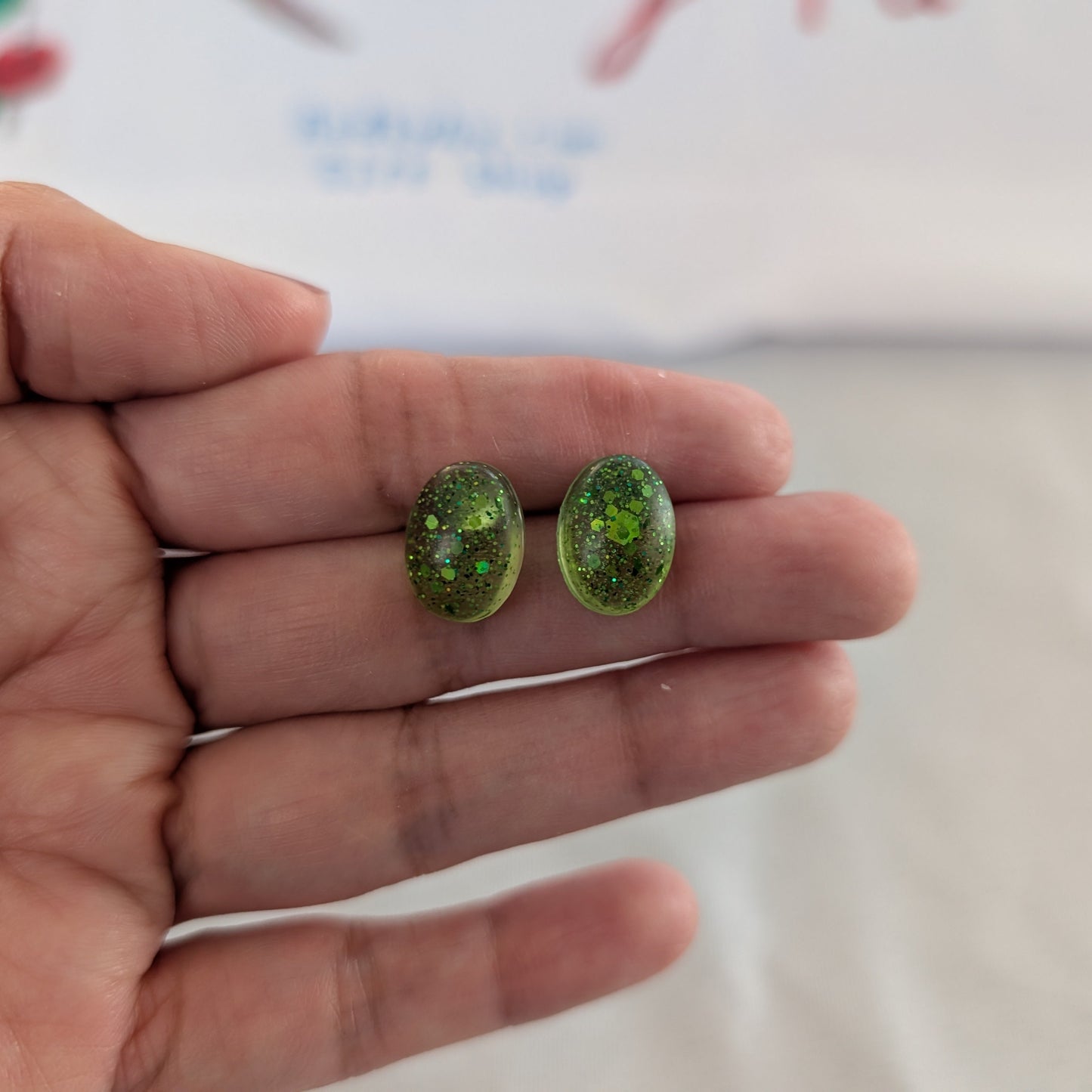 These earrings feature a sleek and modern design, adding a touch of sophistication to your style. Made with high-quality resin, they are lightweight and comfortable to wear all day long.