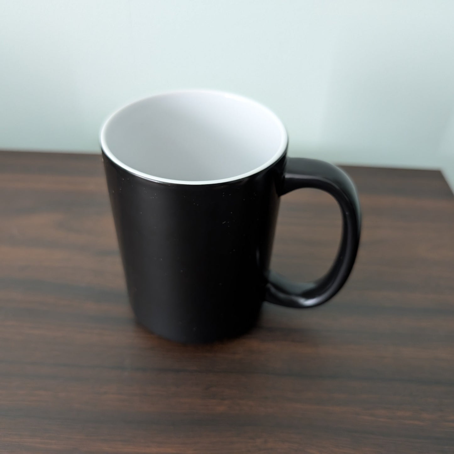 Custom 15oz heat-sensitive color changing coffee mug personalized with custom photo or design.