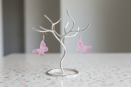 Earrings - Resin butterfly with skull face on hook