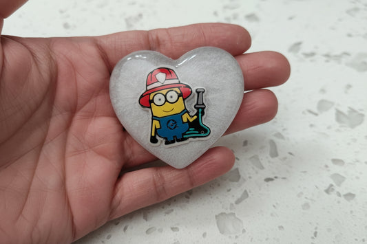 Get ready to add a touch of mischief to your outfit with our 3D minions resin pin! This playful pin features a silver butterfly clutch for easy application and measures 1.75 x 2 inches. Weighing only 0.40 oz, it's the perfect accessory for any outfit. Join the minion madness and grab yours today!
Pin - 3D minions resin pin with silver butterfly clutch
