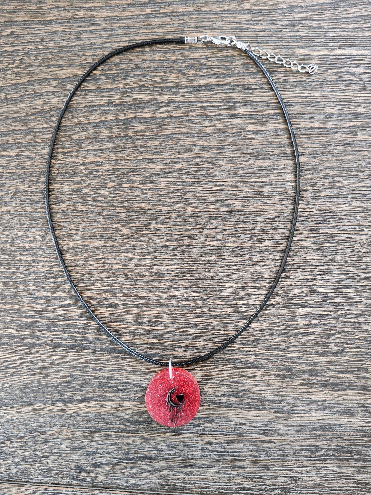 Necklace - 17.5 inches black waxed cord with resin & silver charm pendant