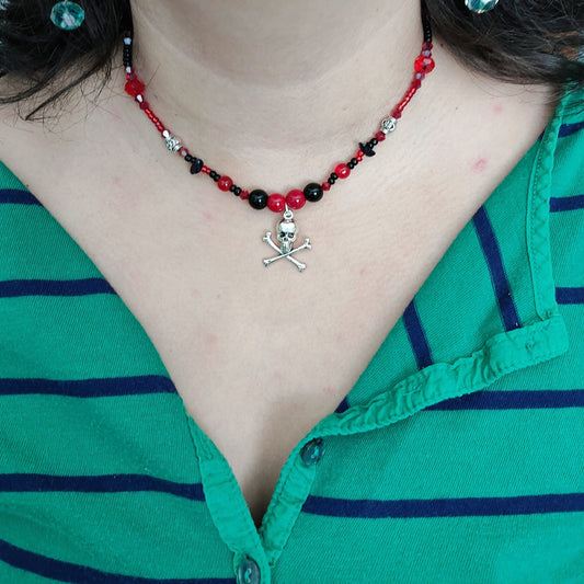 Necklace - 15 inches red & black beaded necklace with silver skull charm