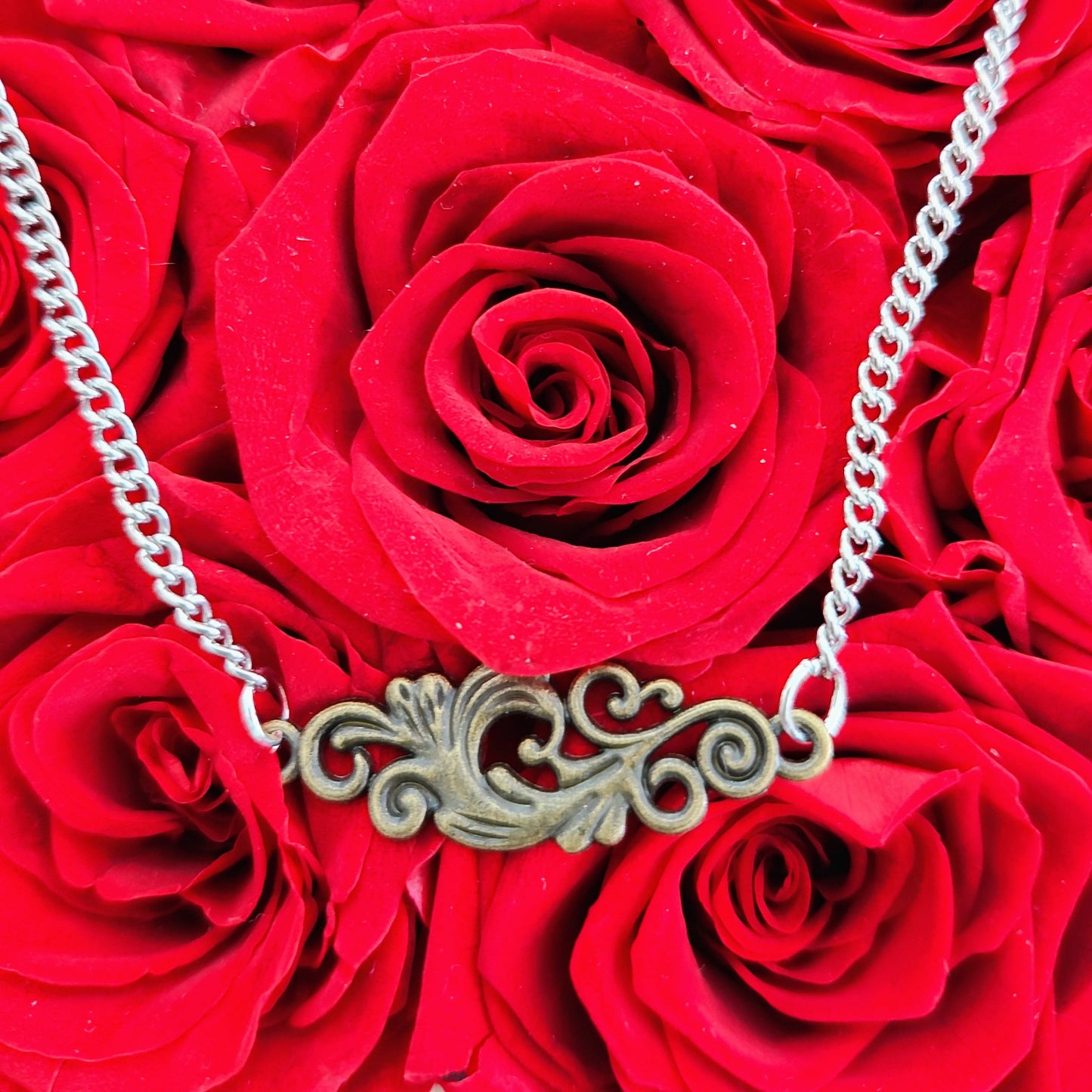 Necklace - 18 inches silver chain with bronze charm and silver lobster Clasp