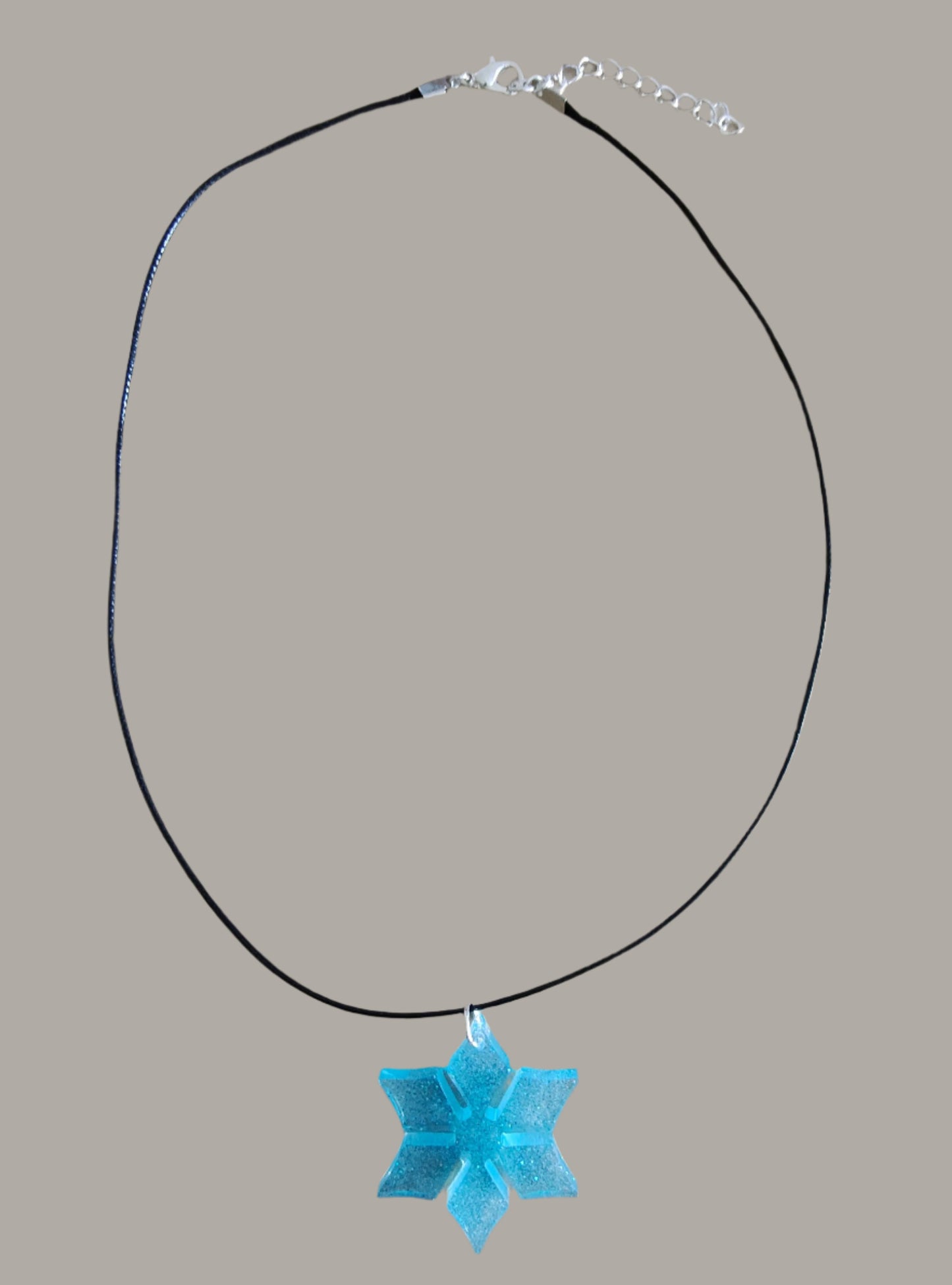 Necklace - 19 inches 0.5 mm black polyester cord with resin holiday pendant