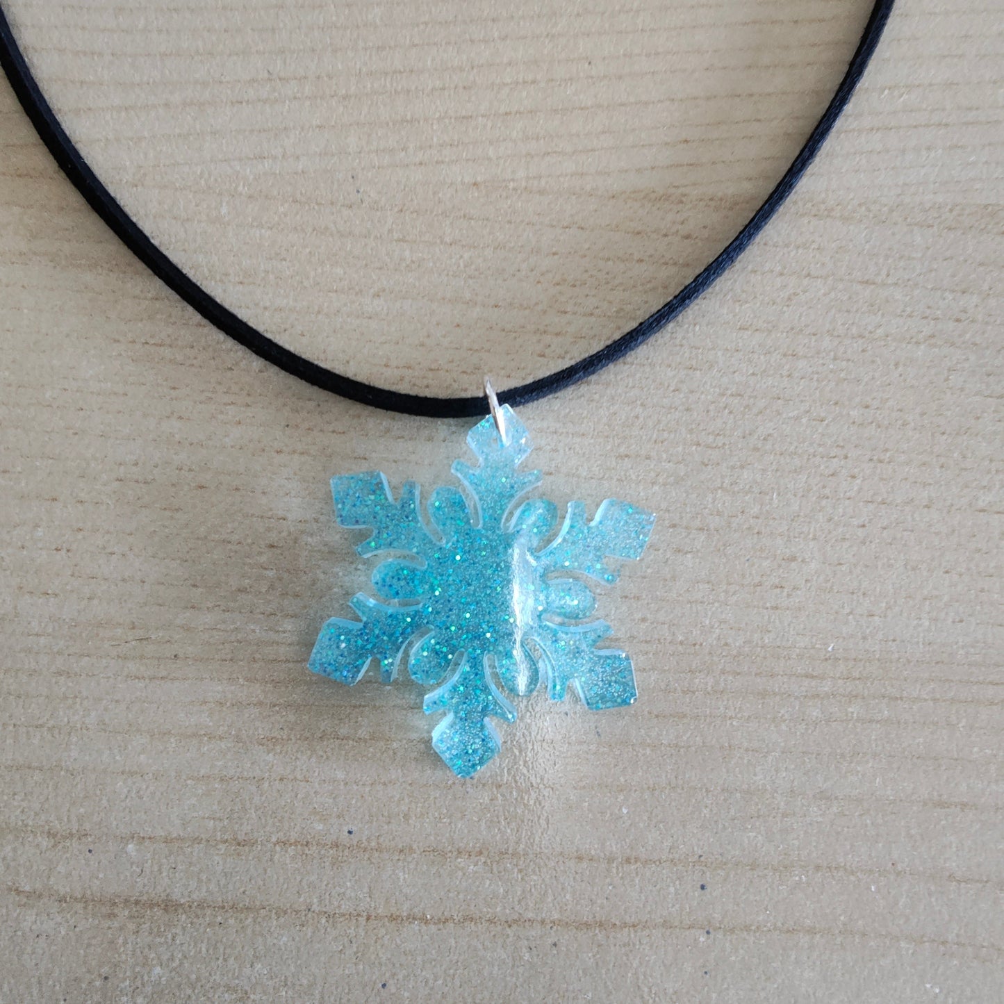 Necklace - 17.5 inches black suede cord with resin holiday pendant