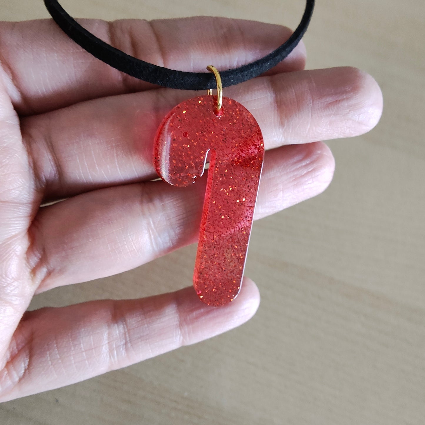 Necklace - 11.5 inches black suede cord with resin holiday pendant