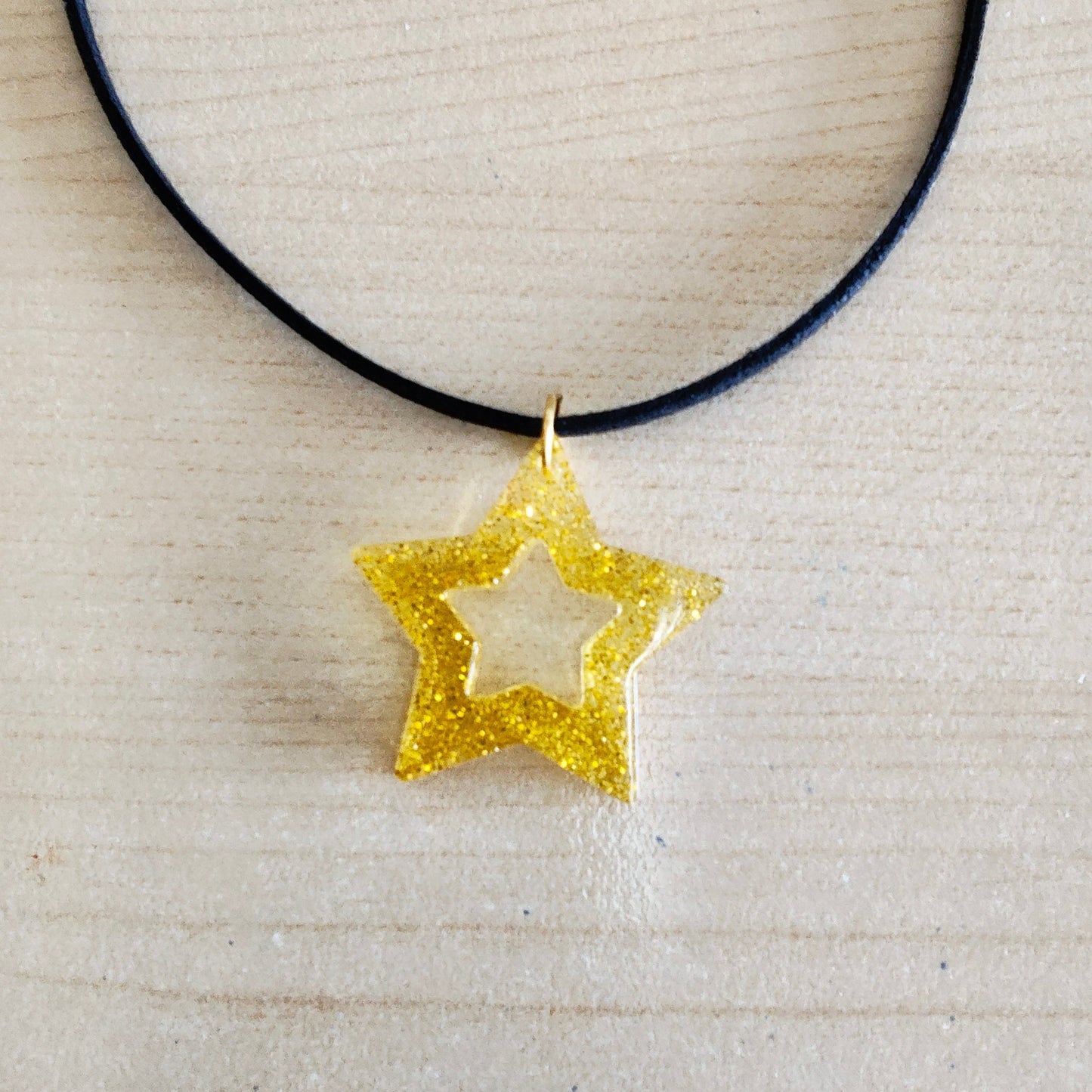 Necklace - 13.5 inches black suede cord with resin holiday pendant