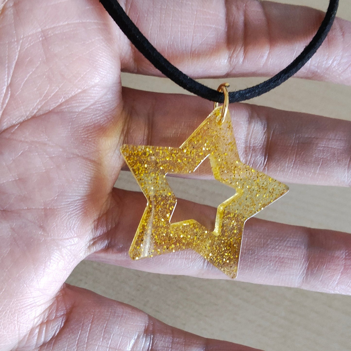 Necklace - 13.5 inches black suede cord with resin holiday pendant