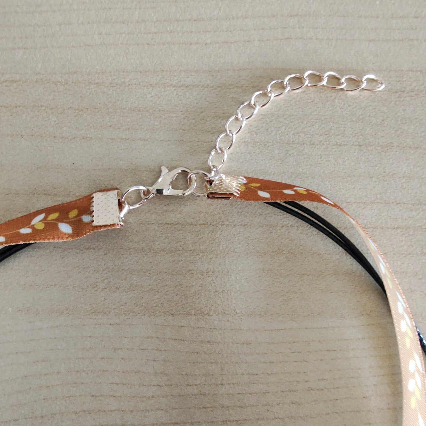 Necklace - Choker fall satin metallic leaves ribbon with two polyester strands and two gold charms