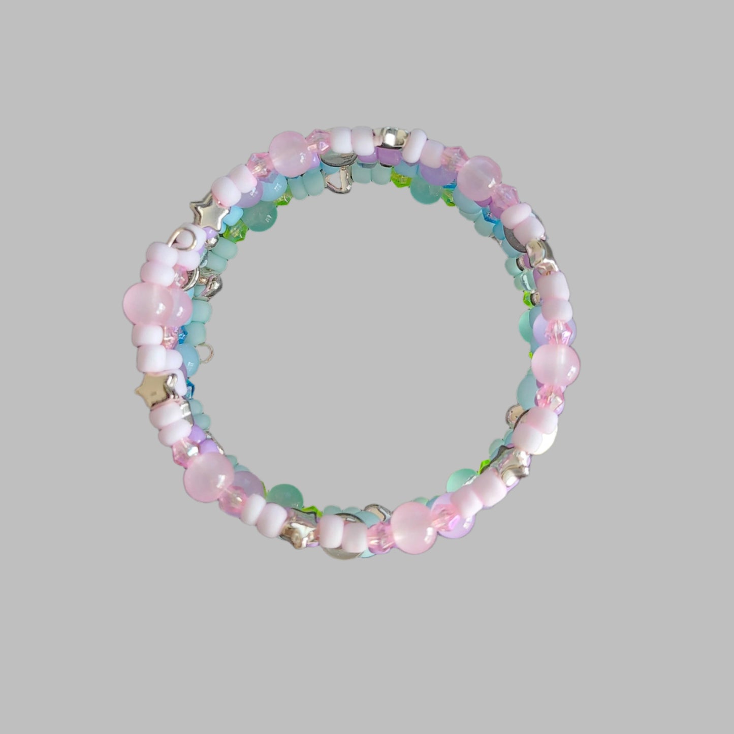 Bracelet - 4 coil Pink, purple, blue, and green beads with rose gold spacer beads memory wire bracelet