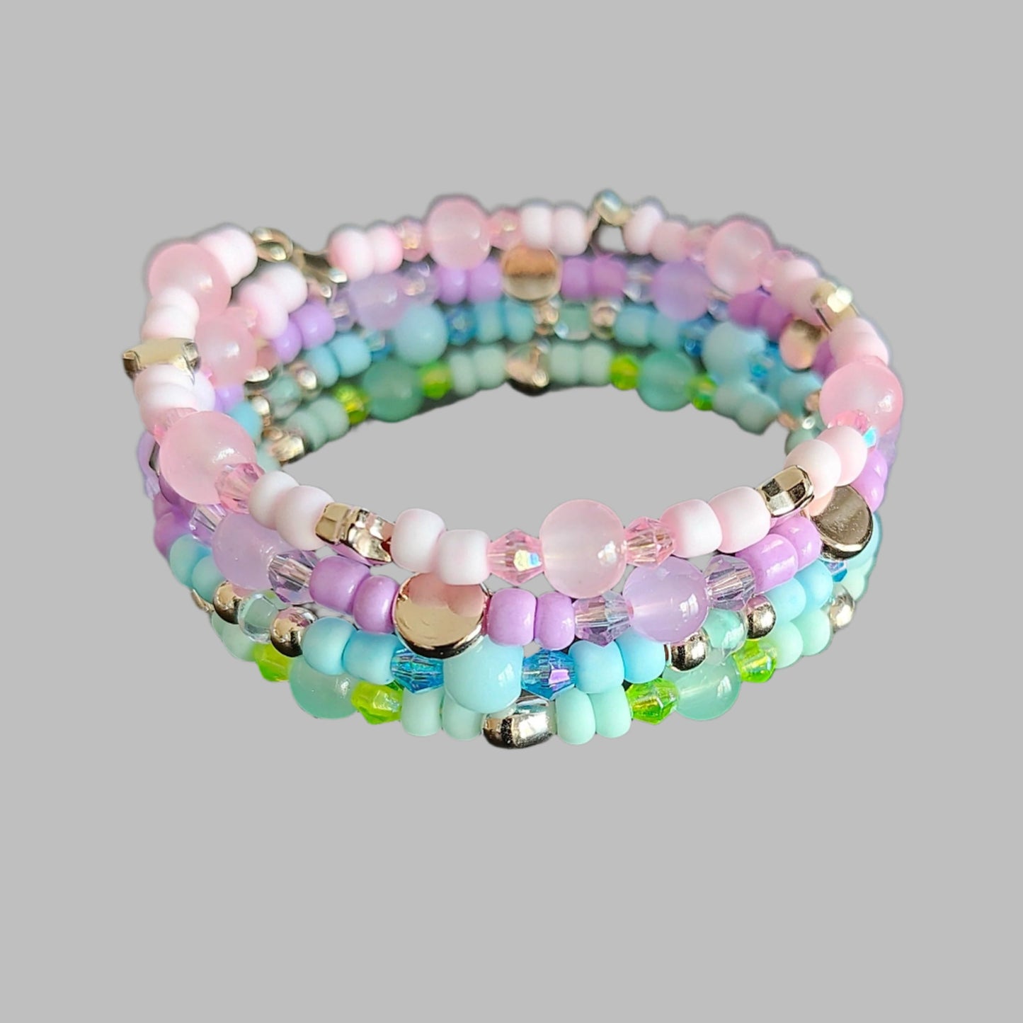 Bracelet - 4 coil Pink, purple, blue, and green beads with rose gold spacer beads memory wire bracelet