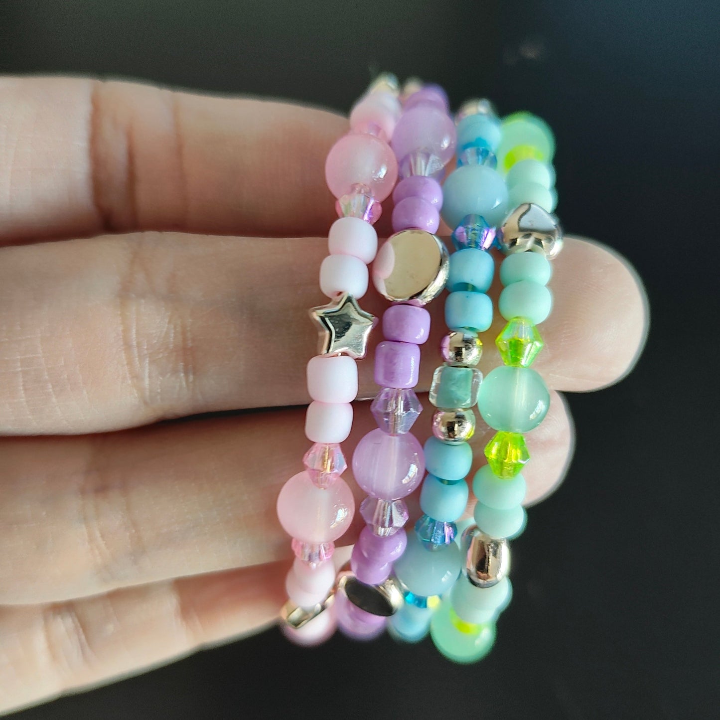 Bracelet - 4 coil Pink, purple, blue, and green beads with rose gold spacer beads memory wire bracelet