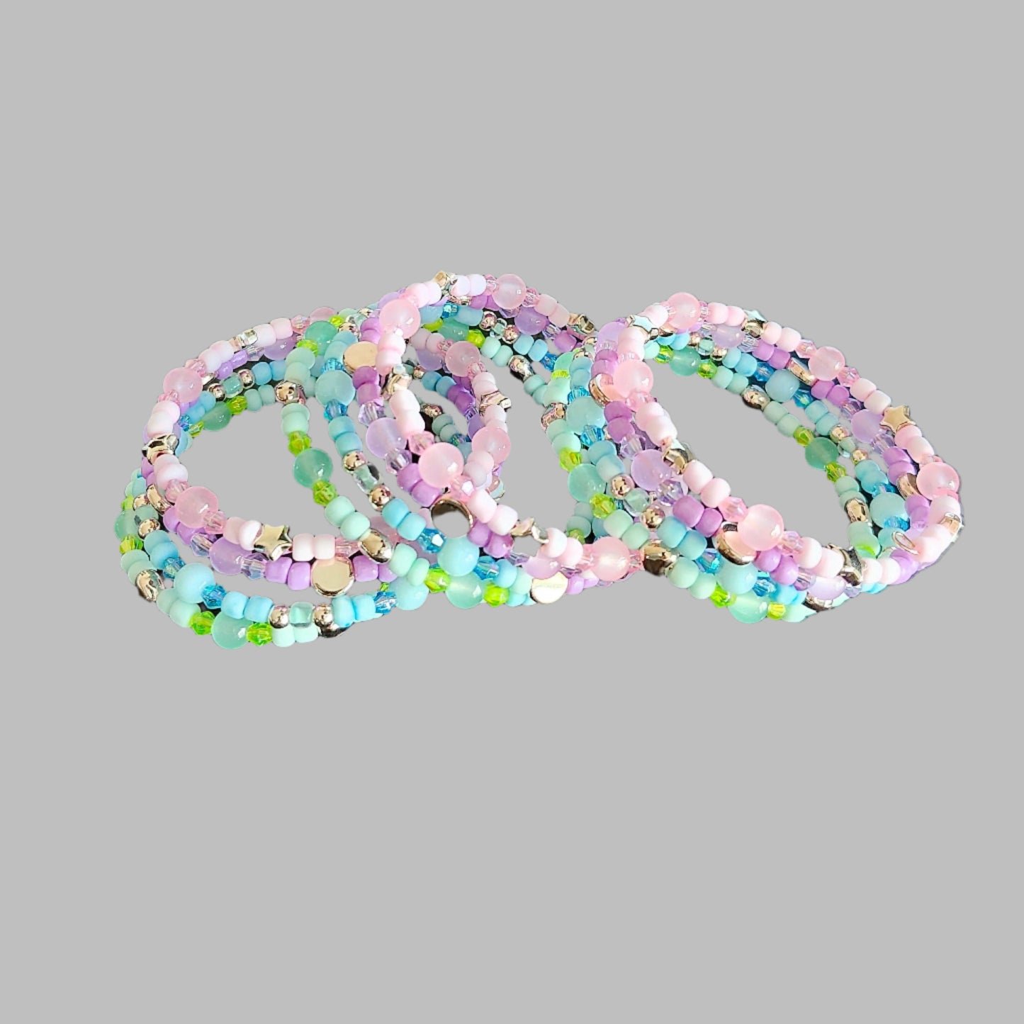 Bracelet - 4 coil Pink, purple, blue, and green beads with rose gold spacer beads memory wire bracelet