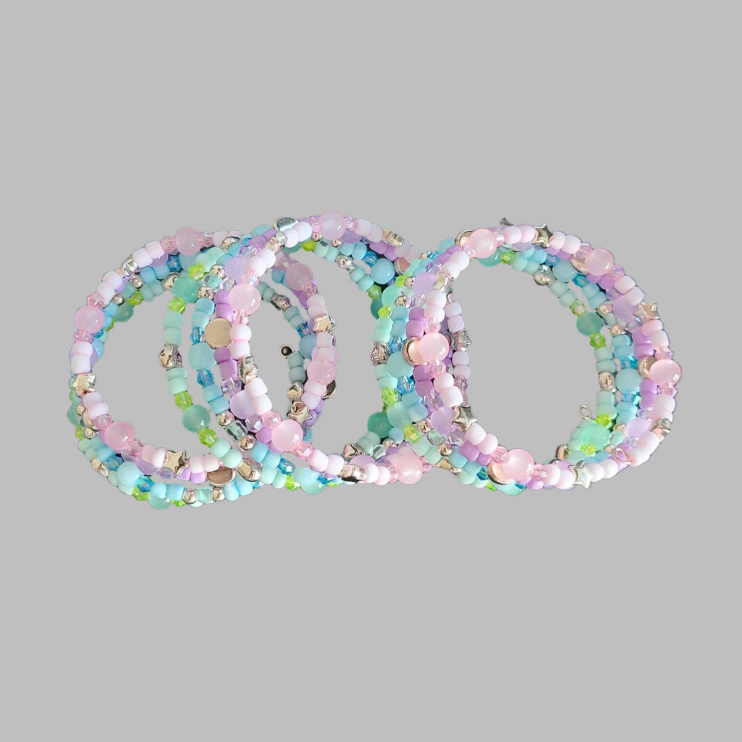 Bracelet - 4 coil Pink, purple, blue, and green beads with rose gold spacer beads memory wire bracelet