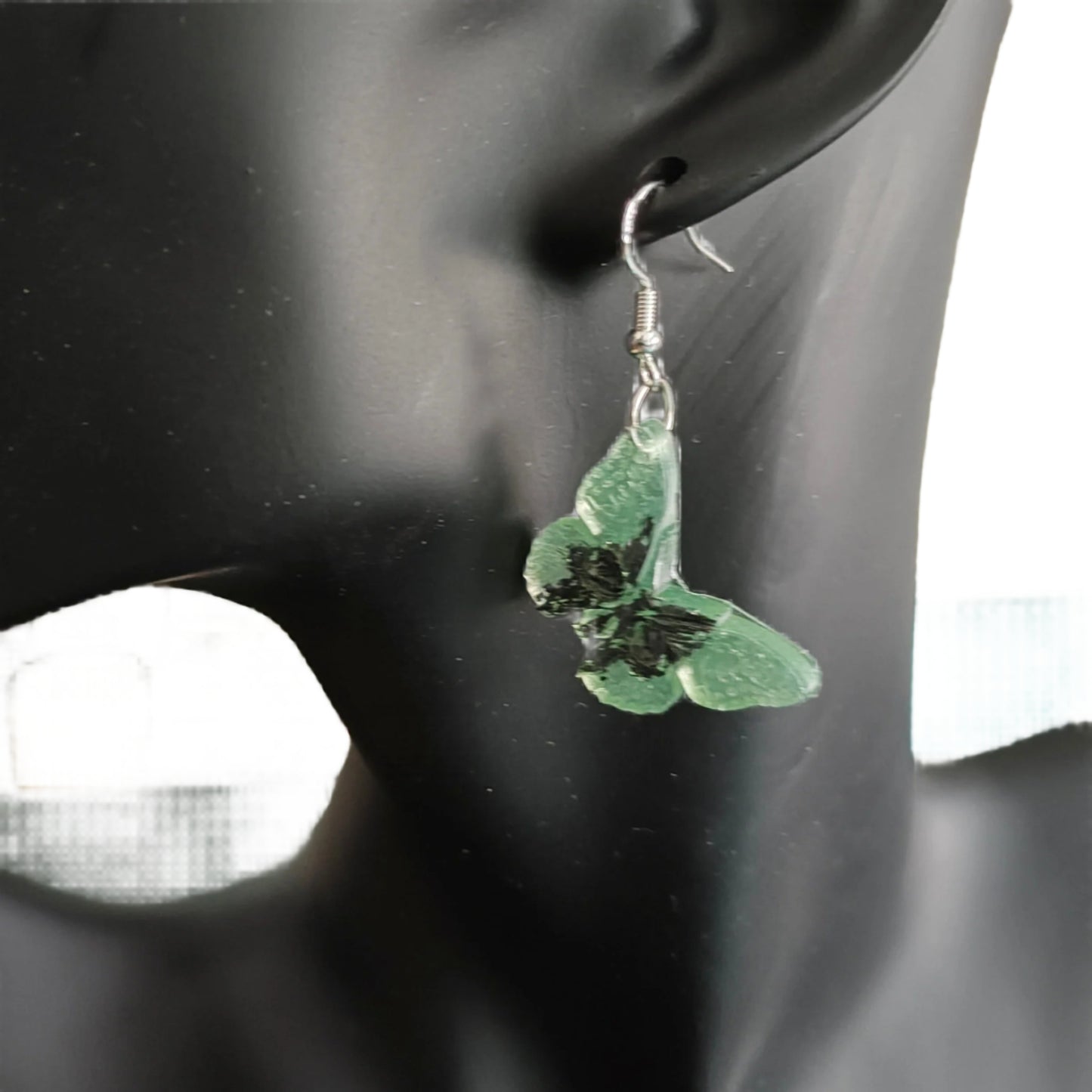 Earrings - Resin butterfly with skull face on hook