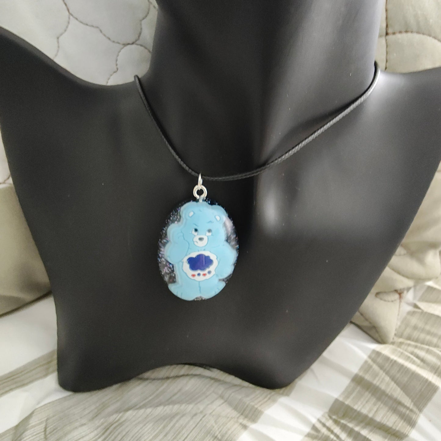 Necklace - 17.5 inches black waxed cord with resin care bear pendant
