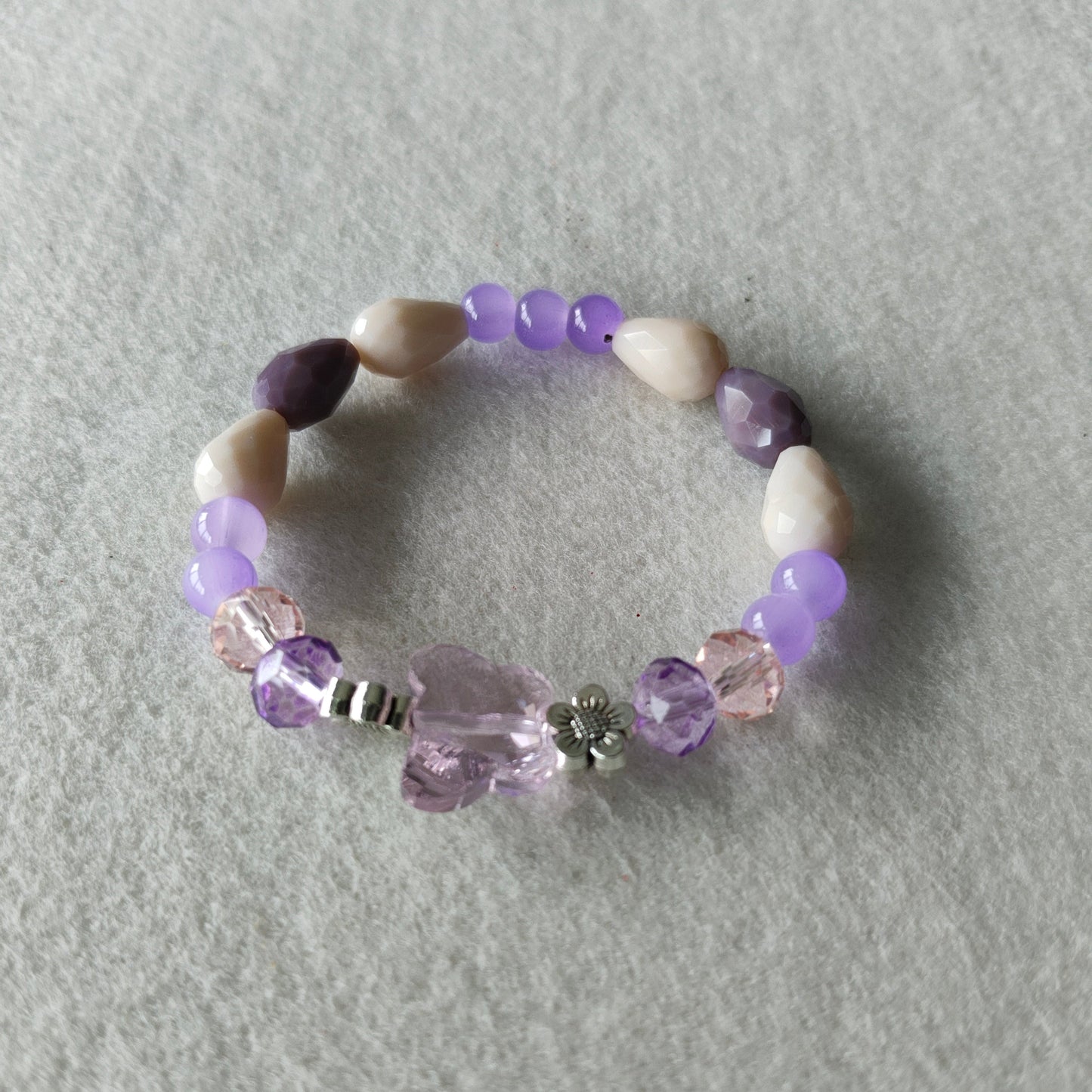 Bracelet - Elastic Crystal butterfly bead with pink and purple beads and flower metal spacer beads