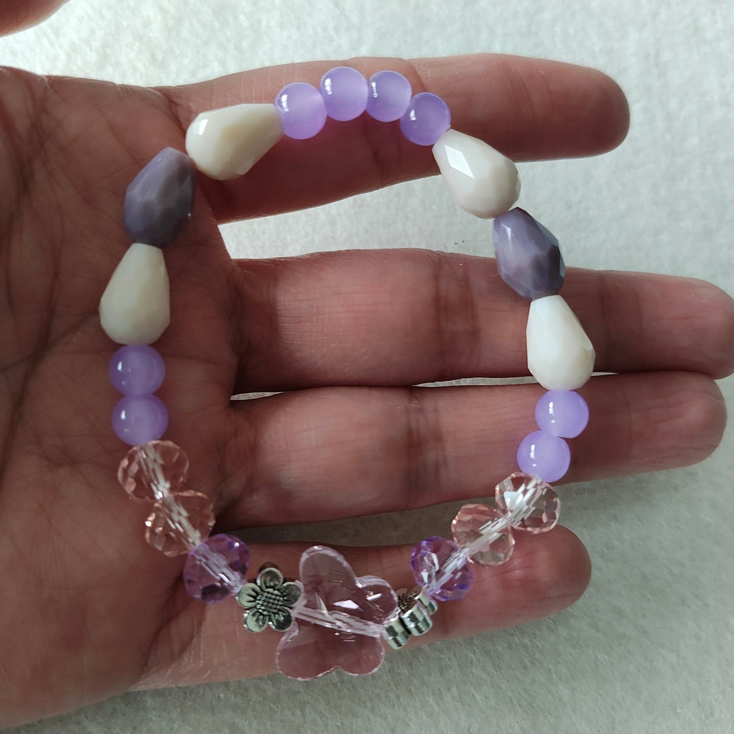 Bracelet - Elastic Crystal butterfly bead with pink and purple beads and flower metal spacer beads