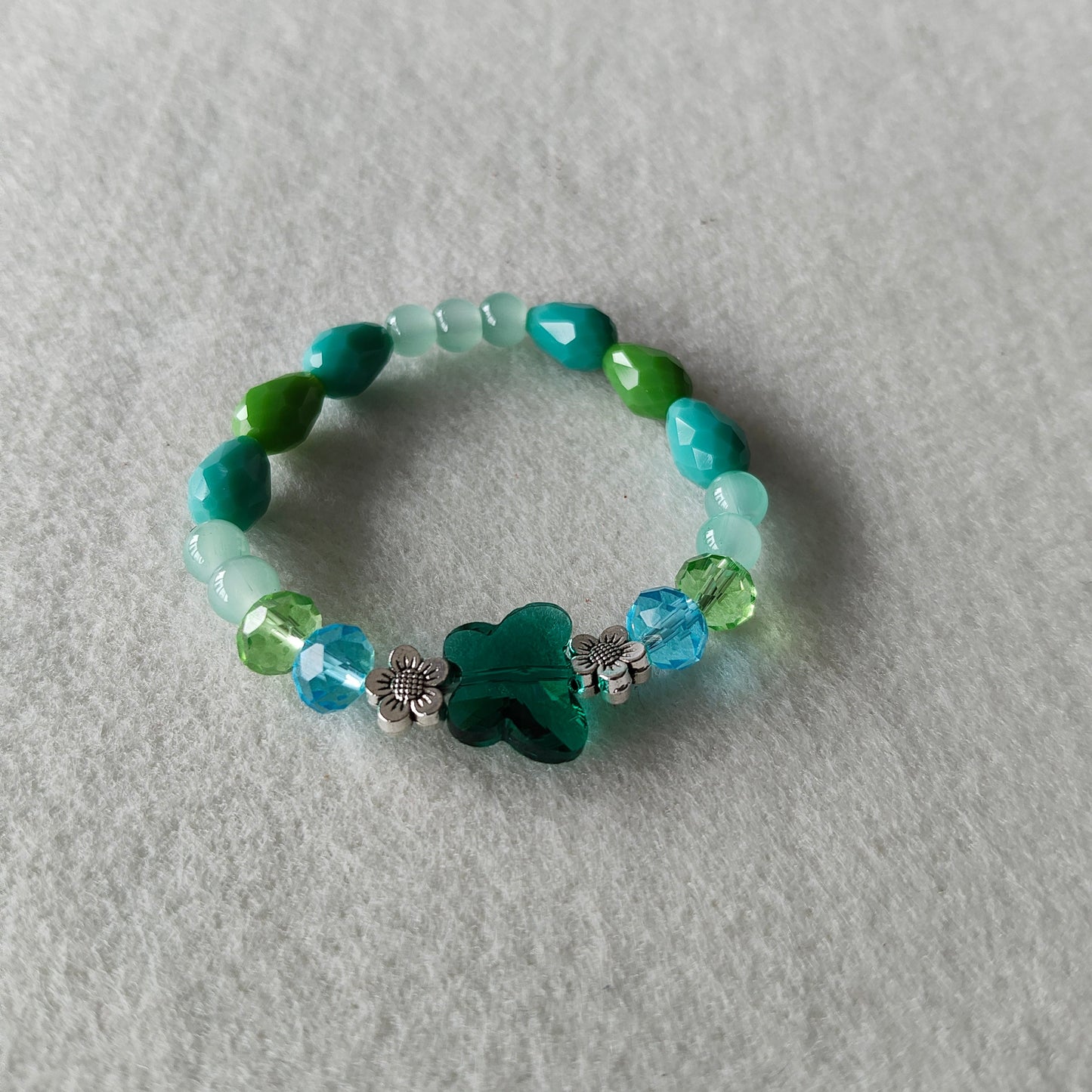 Bracelet - Elastic Crystal butterfly bead with blue and green beads and flower metal spacer beads