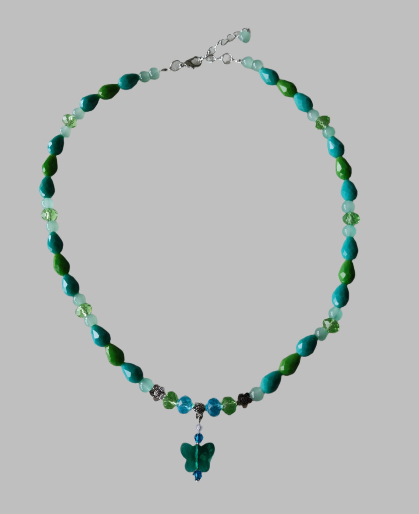 Necklace - 19.5 inches with crystal butterfly and glass beads and metal flower beads