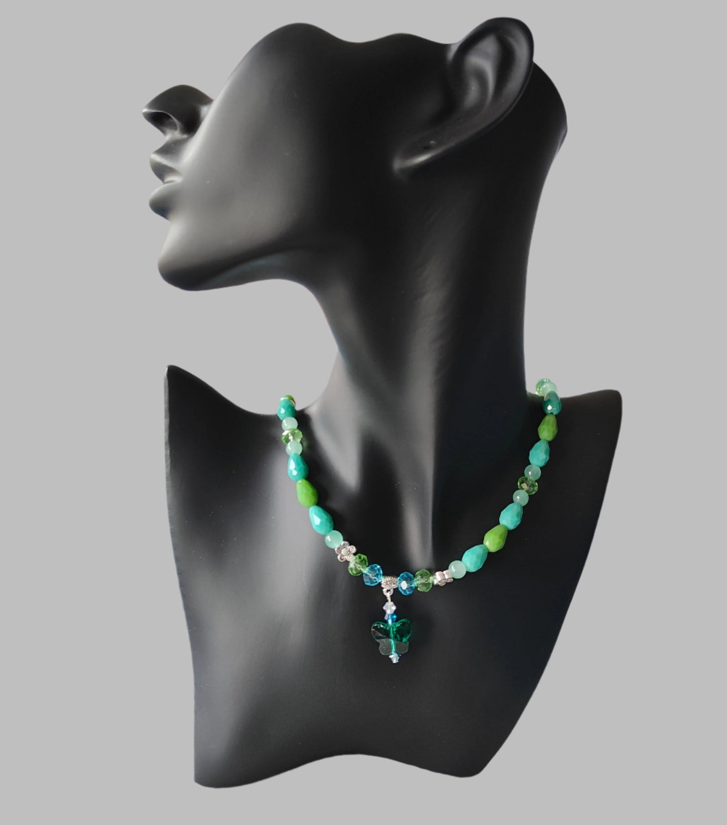 Necklace - 19.5 inches with crystal butterfly and glass beads and metal flower beads