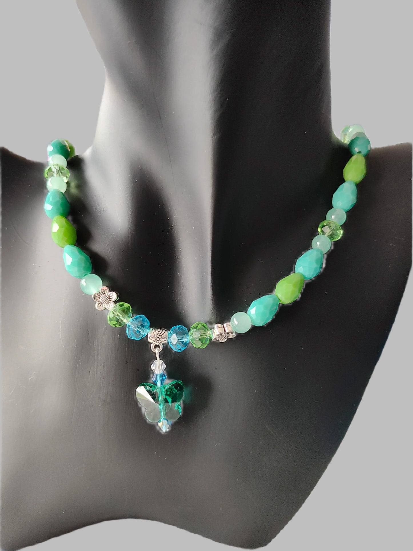 Necklace - 19.5 inches with crystal butterfly and glass beads and metal flower beads