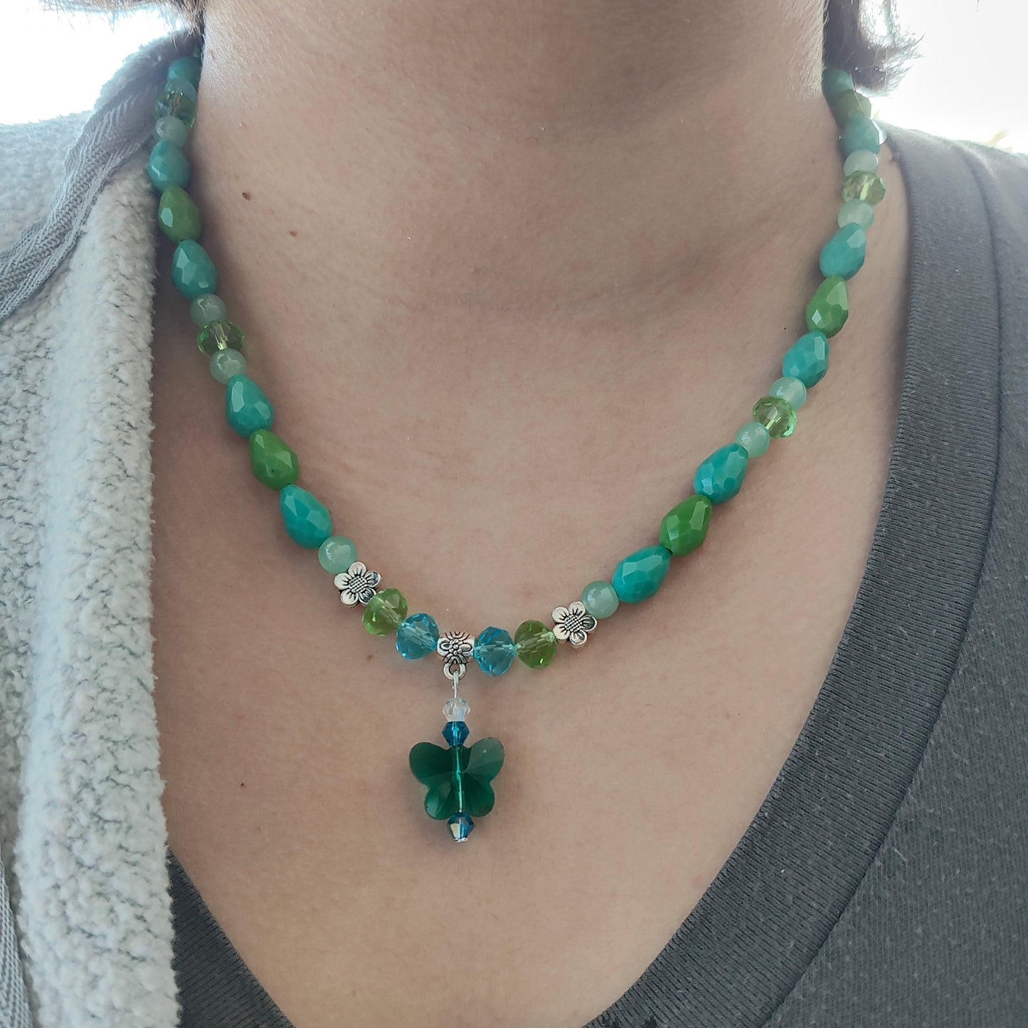 Necklace - 19.5 inches with crystal butterfly and glass beads and metal flower beads