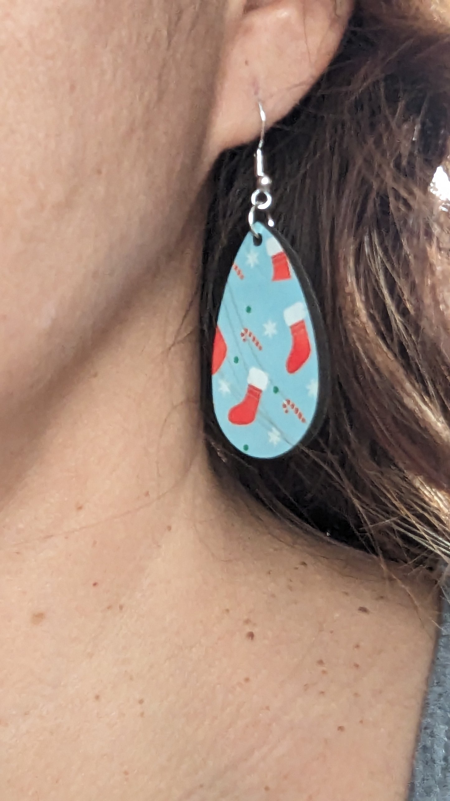 Earrings - Double sided sublimated stockings and candy canes on blue background image on silver hook