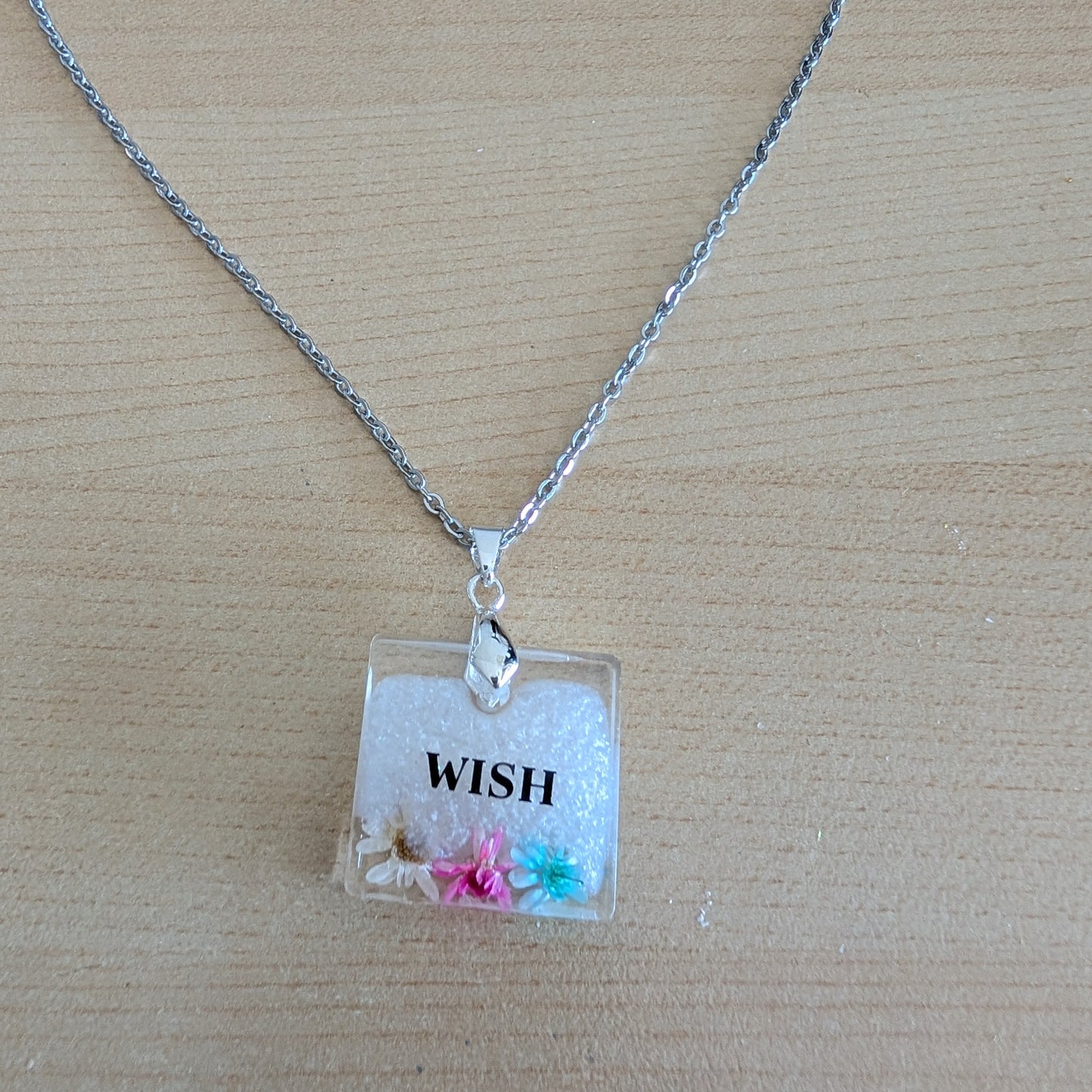 Necklace - 21 inches stainless steel cable link chain with a resin with flowers square pendant