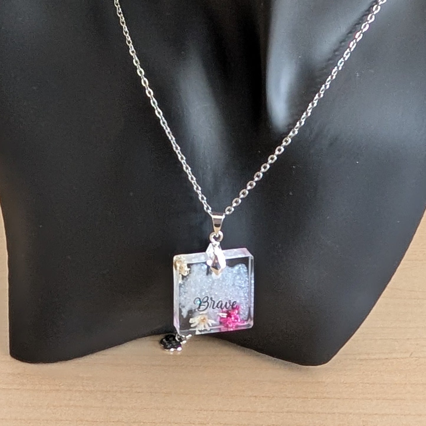 Necklace - 21 inches stainless steel cable link chain with a resin with flowers square pendant