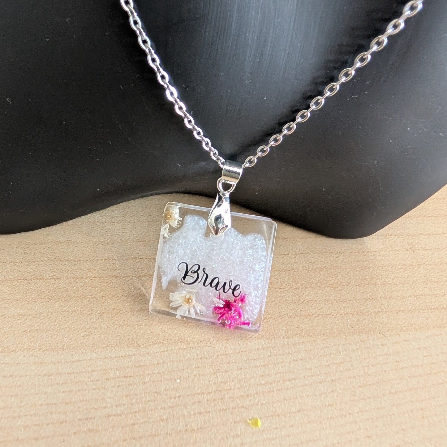 Necklace - 21 inches stainless steel cable link chain with a resin with flowers square pendant
