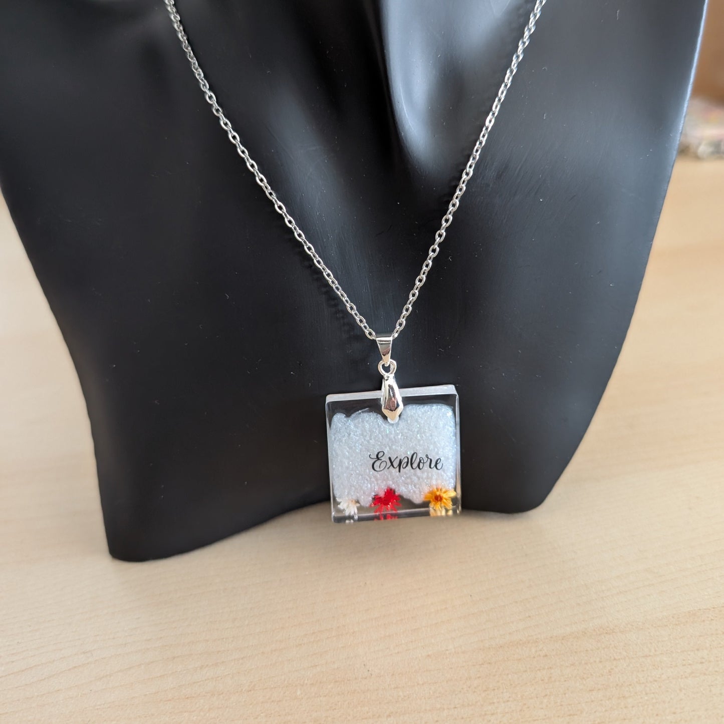 Necklace - 21 inches stainless steel cable link chain with a resin with flowers square pendant