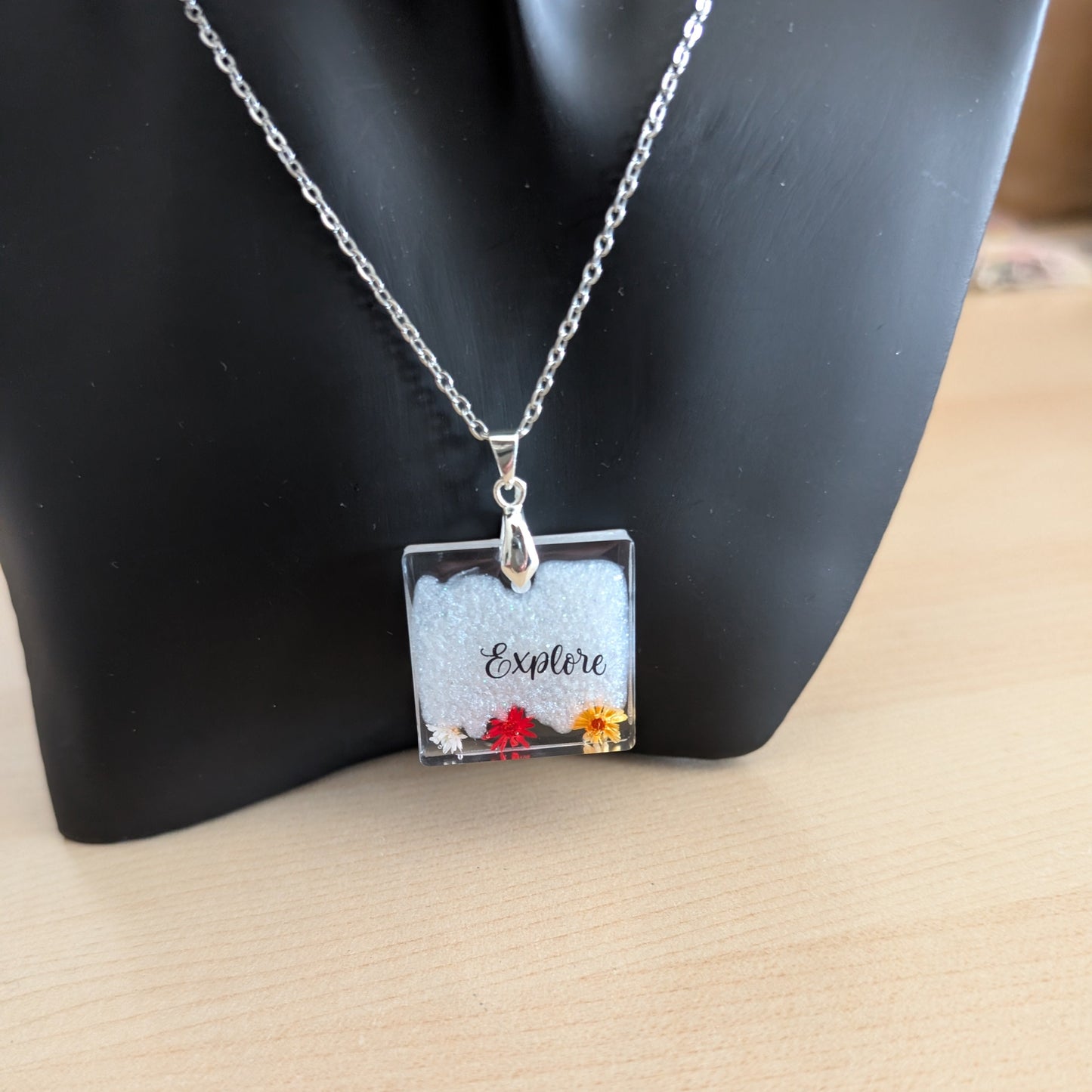 Necklace - 21 inches stainless steel cable link chain with a resin with flowers square pendant