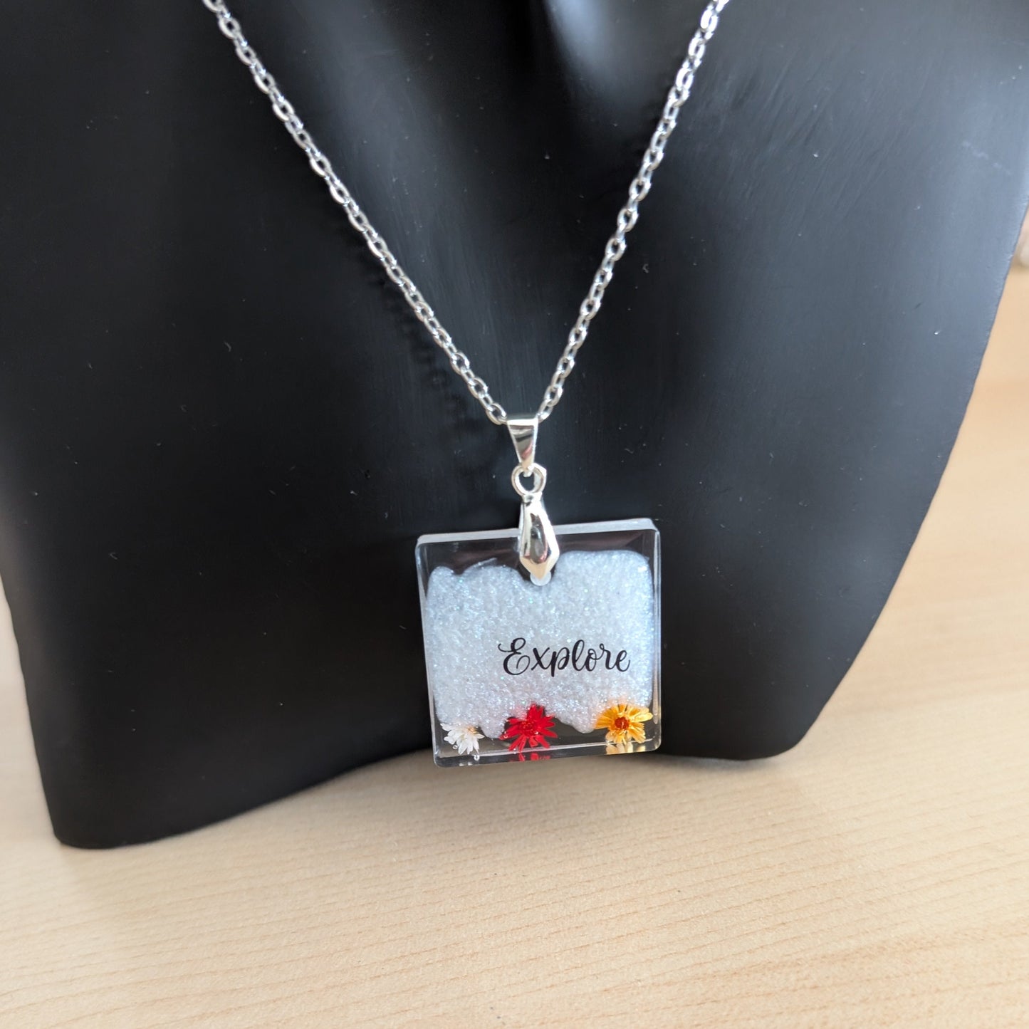 Necklace - 21 inches stainless steel cable link chain with a resin with flowers square pendant
