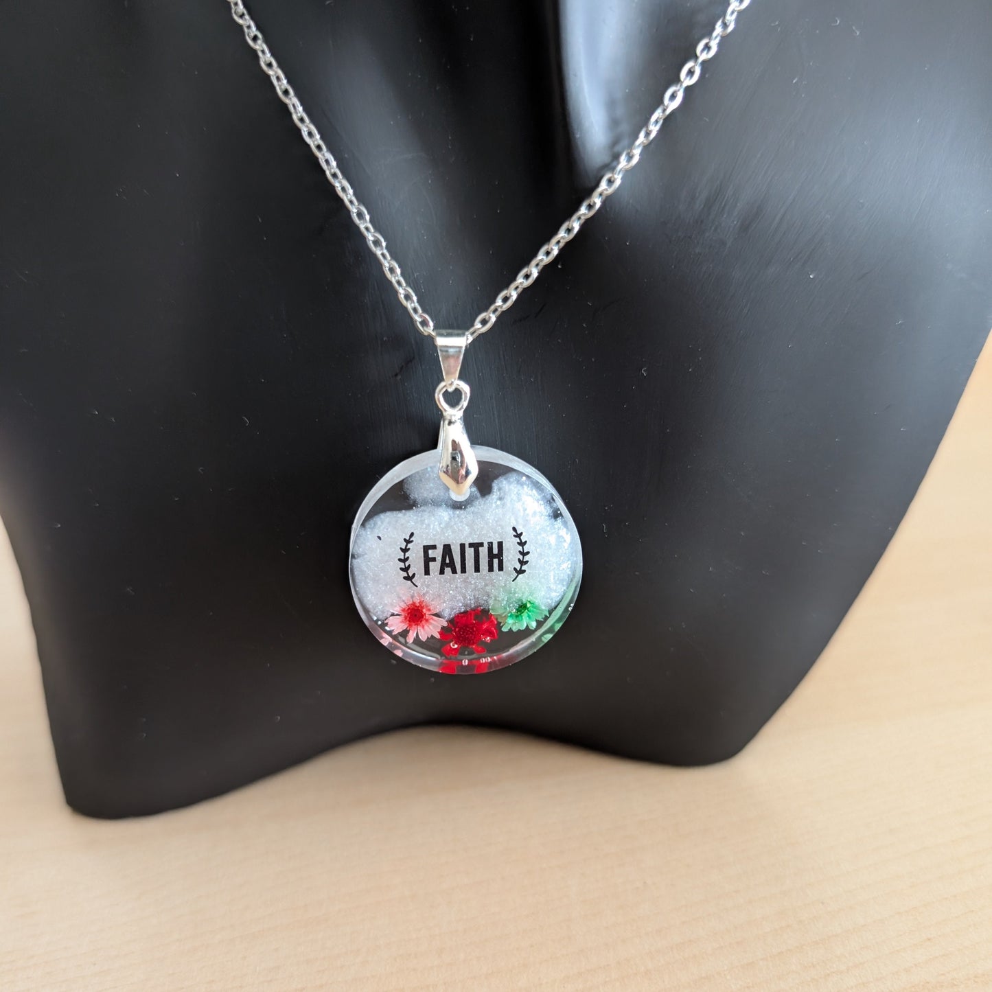 Necklace - 21 inches stainless steel cable link chain with a resin with flowers round pendant