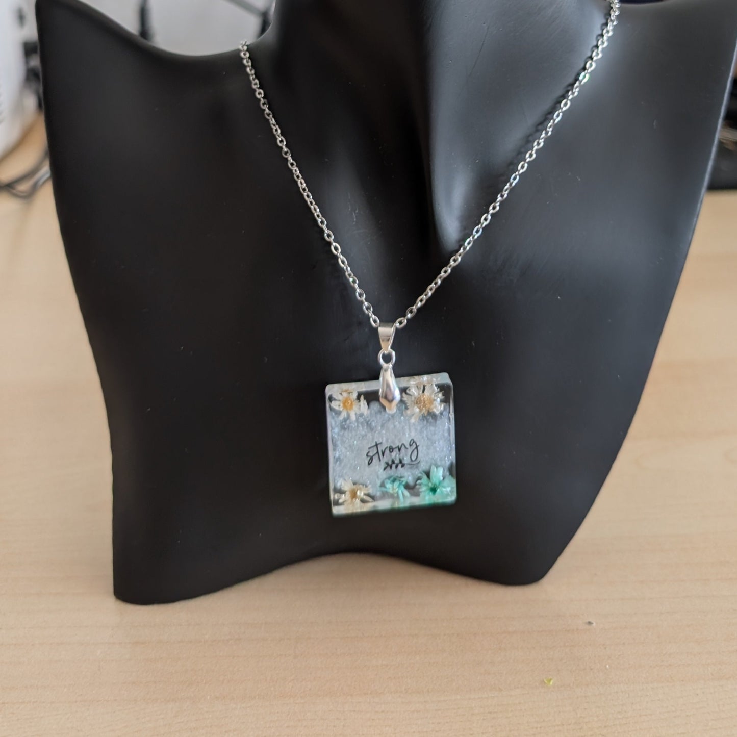 Necklace - 21 inches stainless steel cable link chain with a resin with flowers square pendant