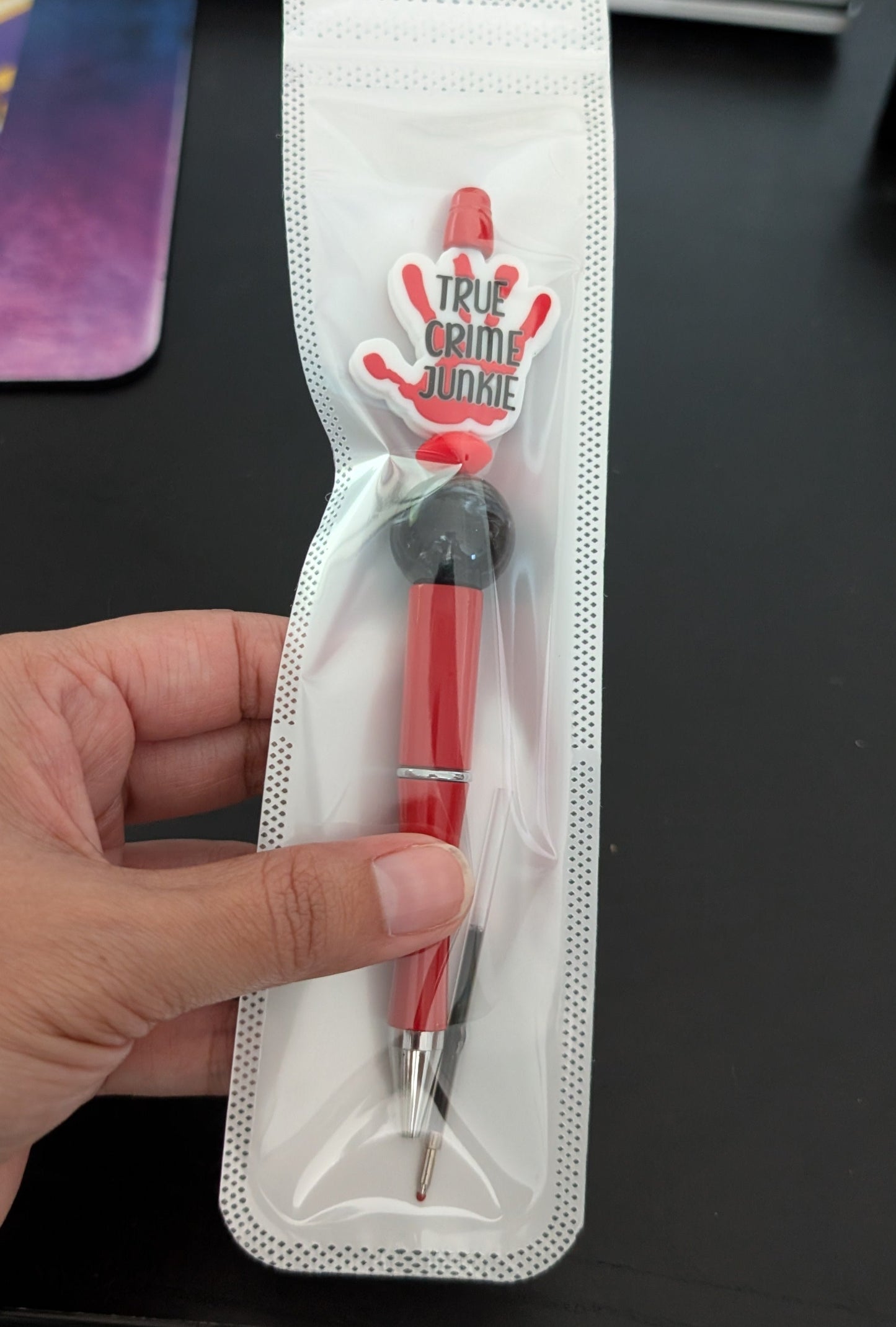 Pen -True Crime Junkie Hand silicon beaded acrylic pen (black ink)