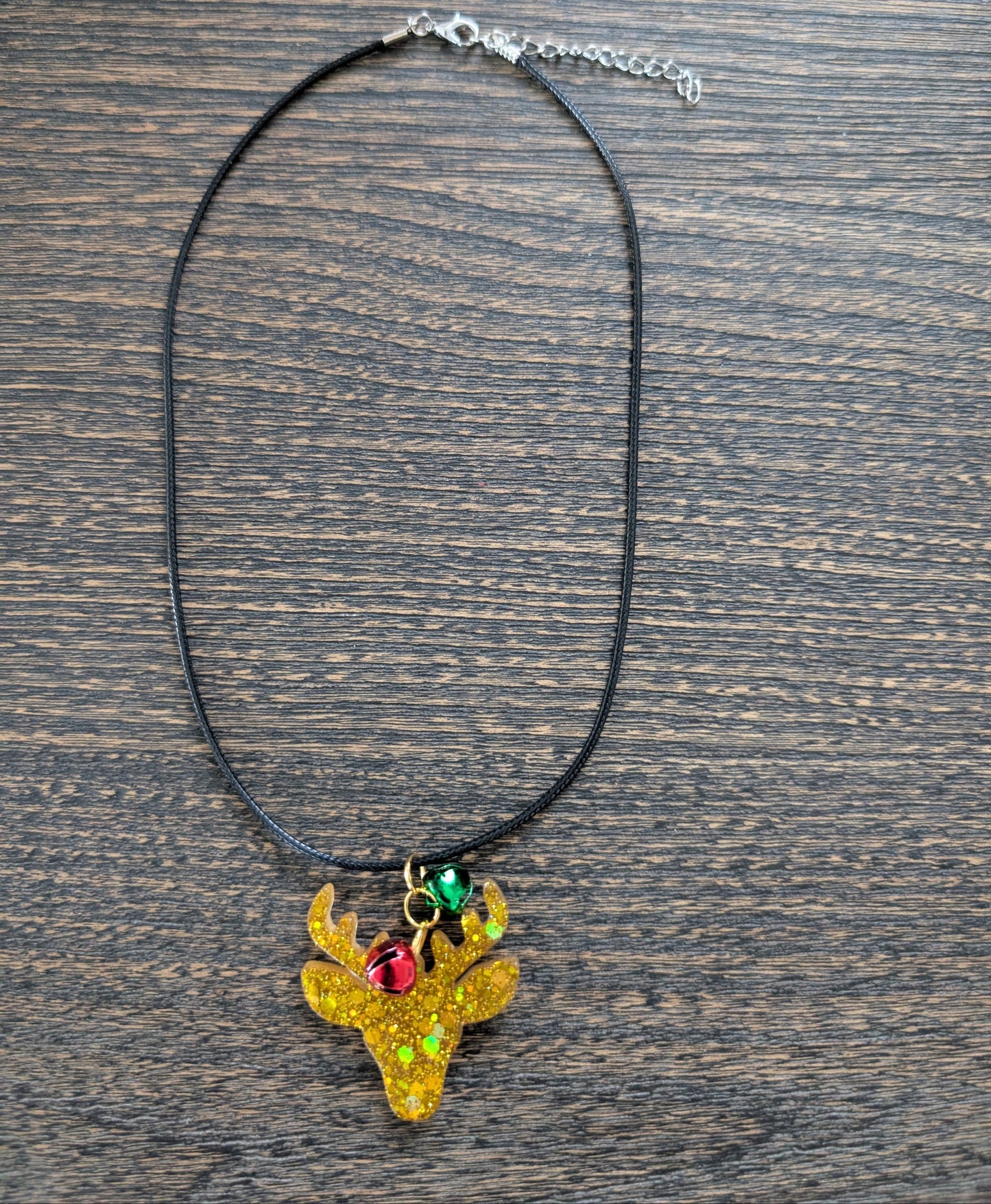 Necklace - 17.5 inches black waxed cord with resin Christmas charm and jingle bells