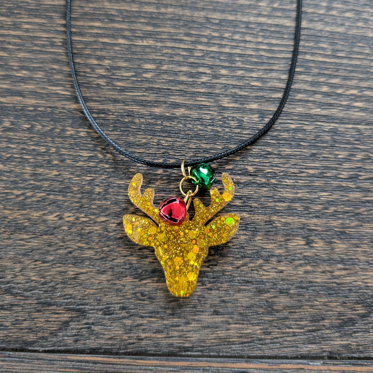 Necklace - 17.5 inches black waxed cord with resin Christmas charm and jingle bells