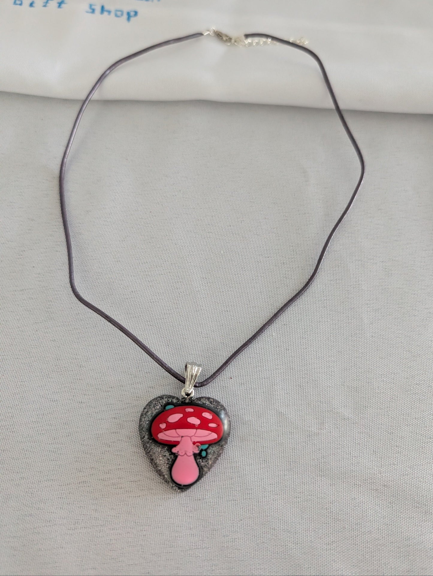 Necklace - 21 inches heart resin mushroom pendant on purple leather cord