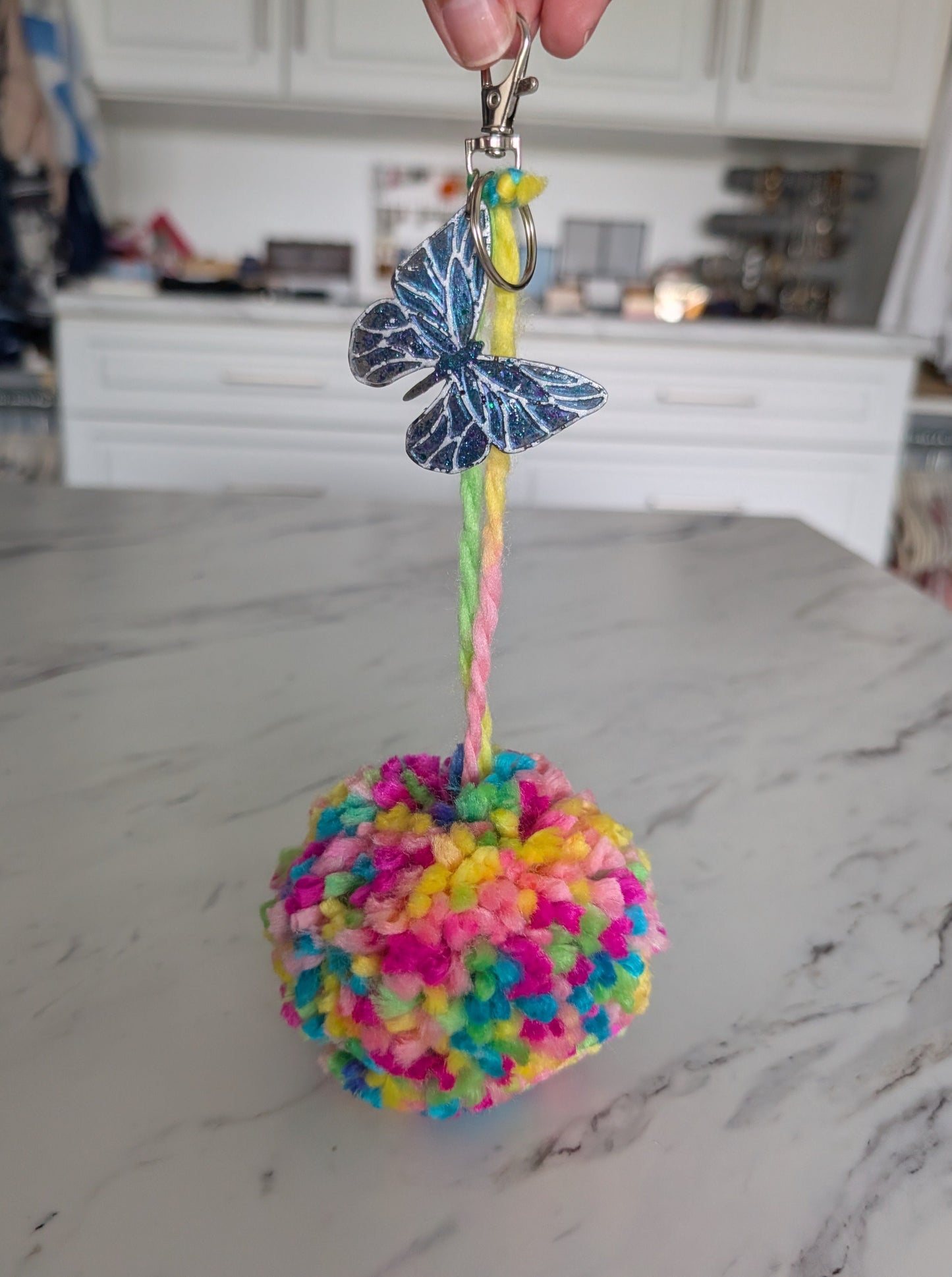 XL Colorful Pom-Pom Charm with Glitter Resin Butterfly Accent