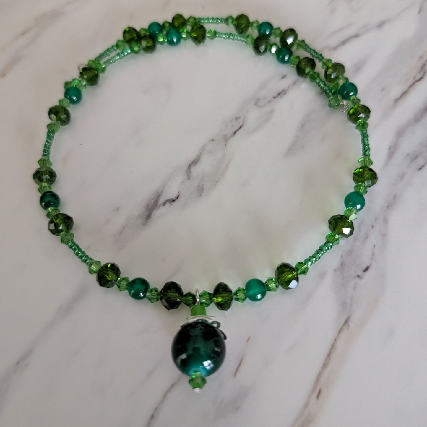 Emerald Green Beaded Memory Wire Choker with Intricate Silver-Capped Pendant