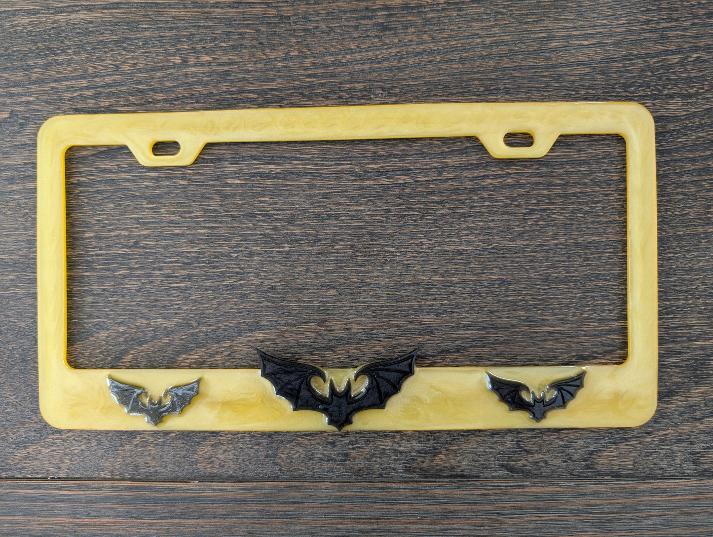 Handcrafted Resin Bat License Plate Holder – Swirly Yellow & Matte Black