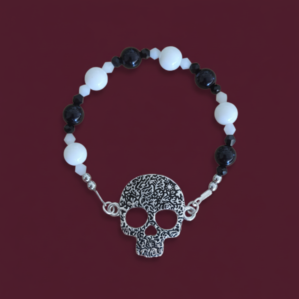 Bracelet - Elastic black & white glass beads and bicone beads with silver skeleton face charm
