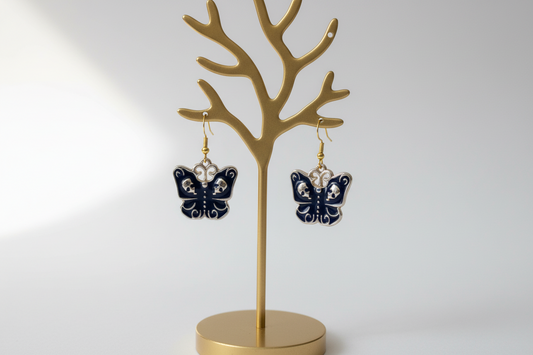 Earrings - Butterfly with skull faces on hook