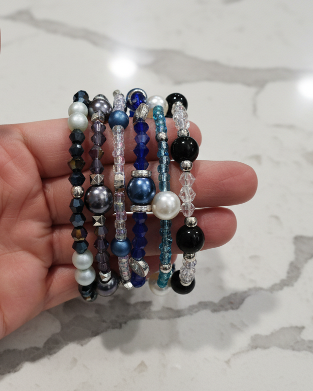 Bracelet - 6 coil black, blue & silver glass beads with white, blue & silver pearl beads and clear, purple, black & blue bicone beads and clear & blue glass seed beads with silver spacer beads memory wire bracelet