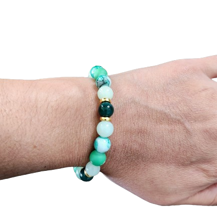 Bracelet - Elastic 8mm green & green patterned glass beads gold spacer beads