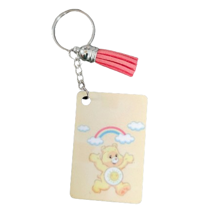 Keychain - Double sided sublimated yellow care bear with acrylic tassel